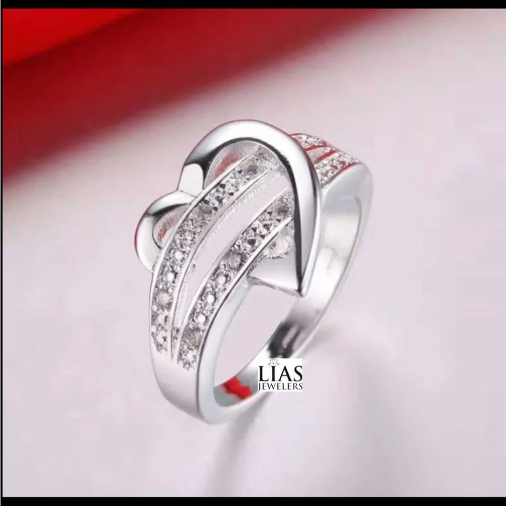 New 18k white gold engagement ring